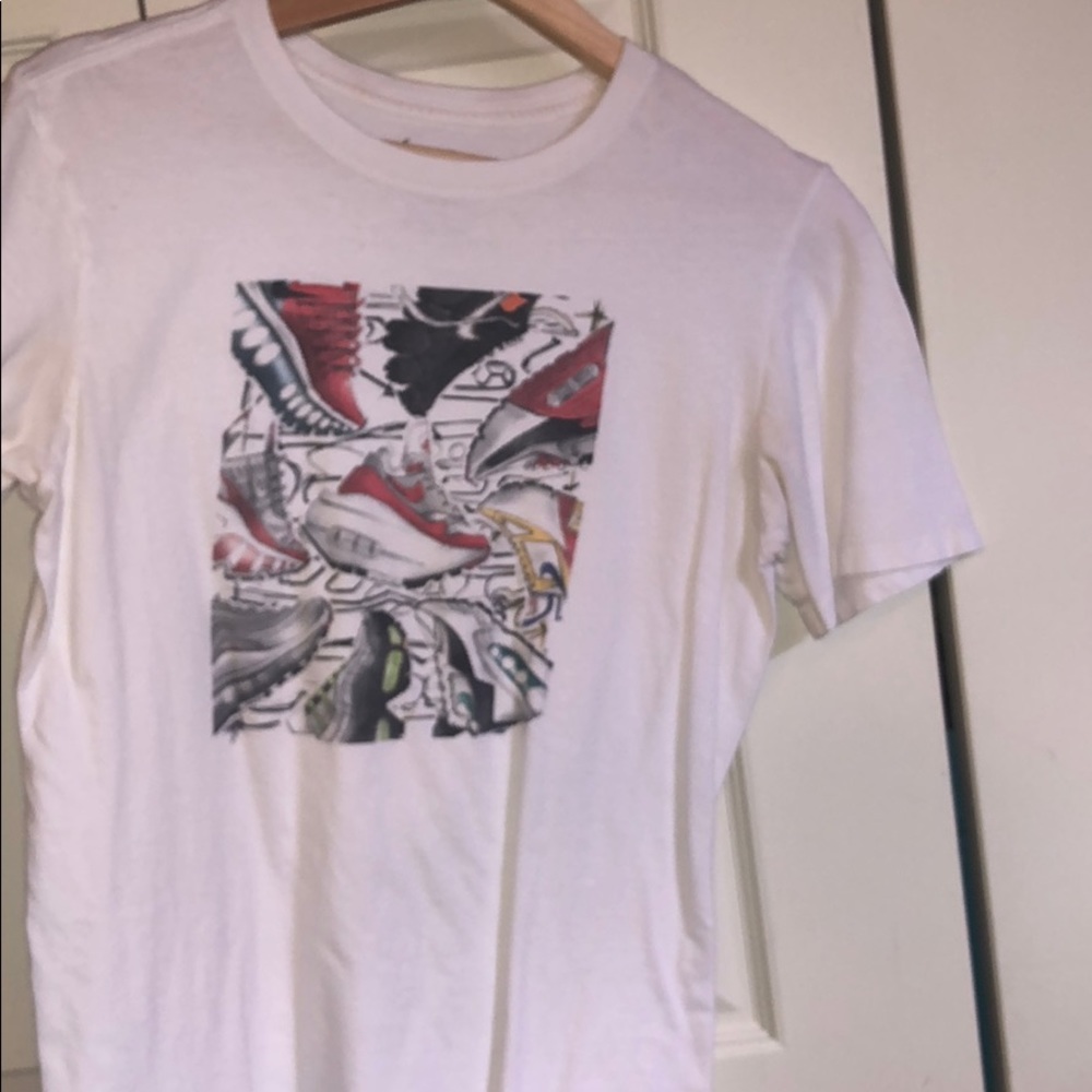 Nike t shirt with shoes on front